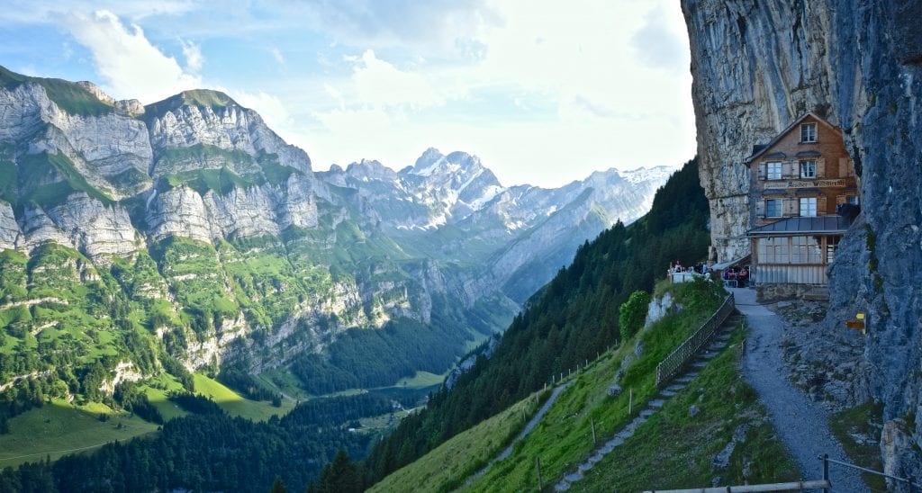 4 Ways To Save Money While Traveling In Switzerland 3 A canyon with a mountain in the background