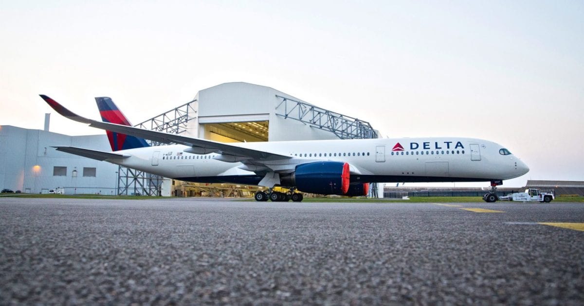 A large passenger jet sitting on top of a runway