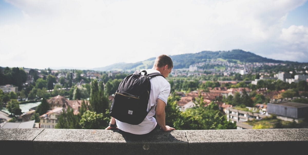 A man standing on top of a mountain