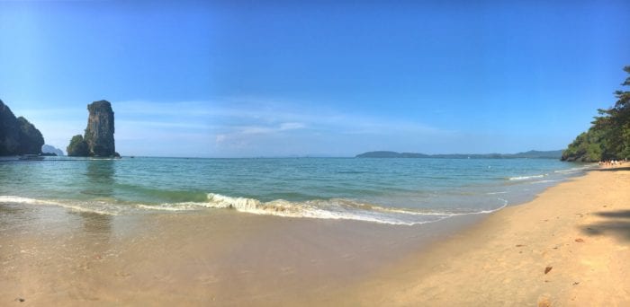 Thrifty Traveler's Guide to Thailand: A Beginner's Guide 16 A sandy beach next to a body of water