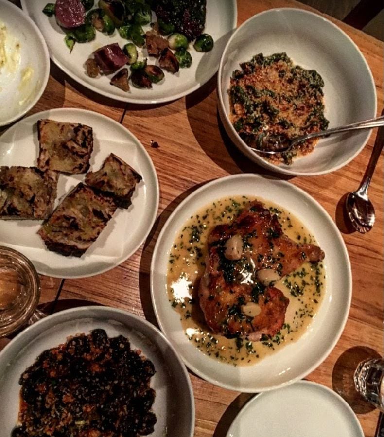 A bowl filled with different types of food on a plate