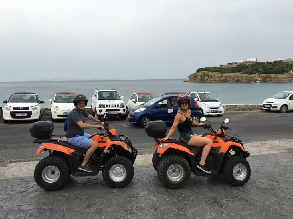 Island Hopping in Greece: Mykonos, Santorini, Crete & Hydra 2 4x4s next to the ocean