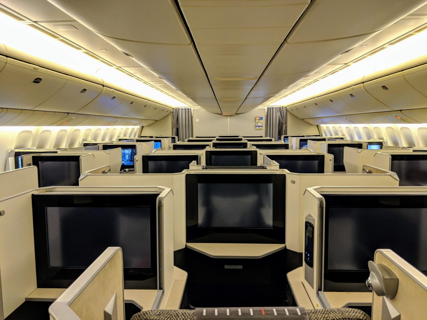 facing forward in a business class cabin 