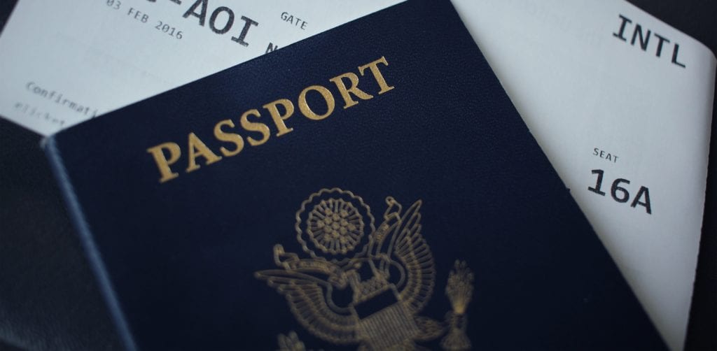 10 Mistakes You Should Stop Making When You Travel 24 a passport with a boarding pass