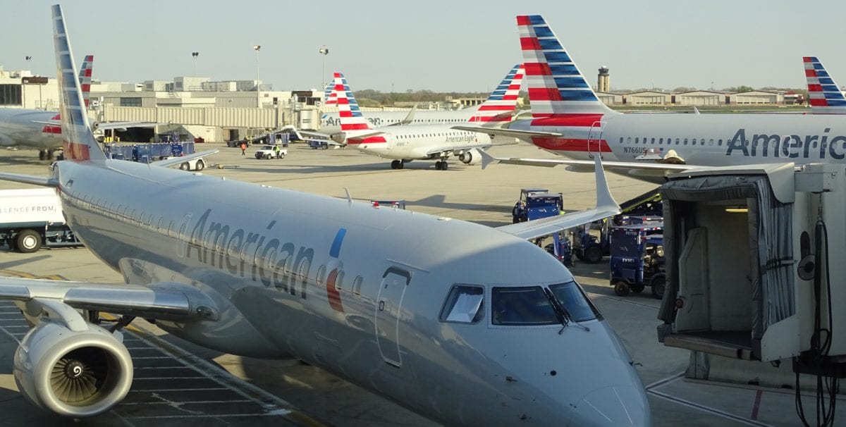 A large passenger jet sitting on top of a tarmac