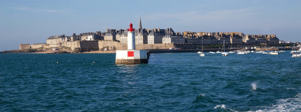 The Secrets of Saint-Malo, a Perfect Escape from Paris 1 A large body of water with a city in the background