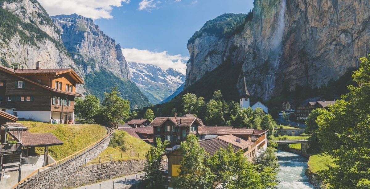 A house with a mountain in the background