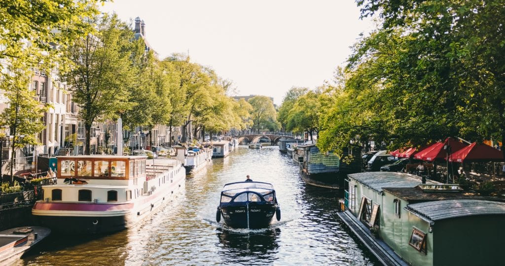 Europe in a Weekend? You Can Do It 6 A boat traveling down a river