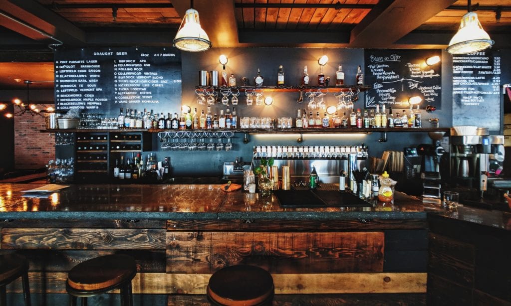 Hotel or Airbnb? How to Choose for Your Next Trip 5 A kitchen with a table in a restaurant