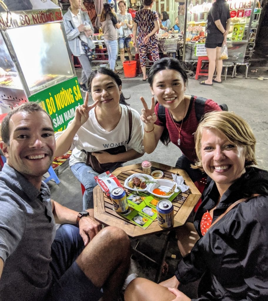 a group of people posing for a camera