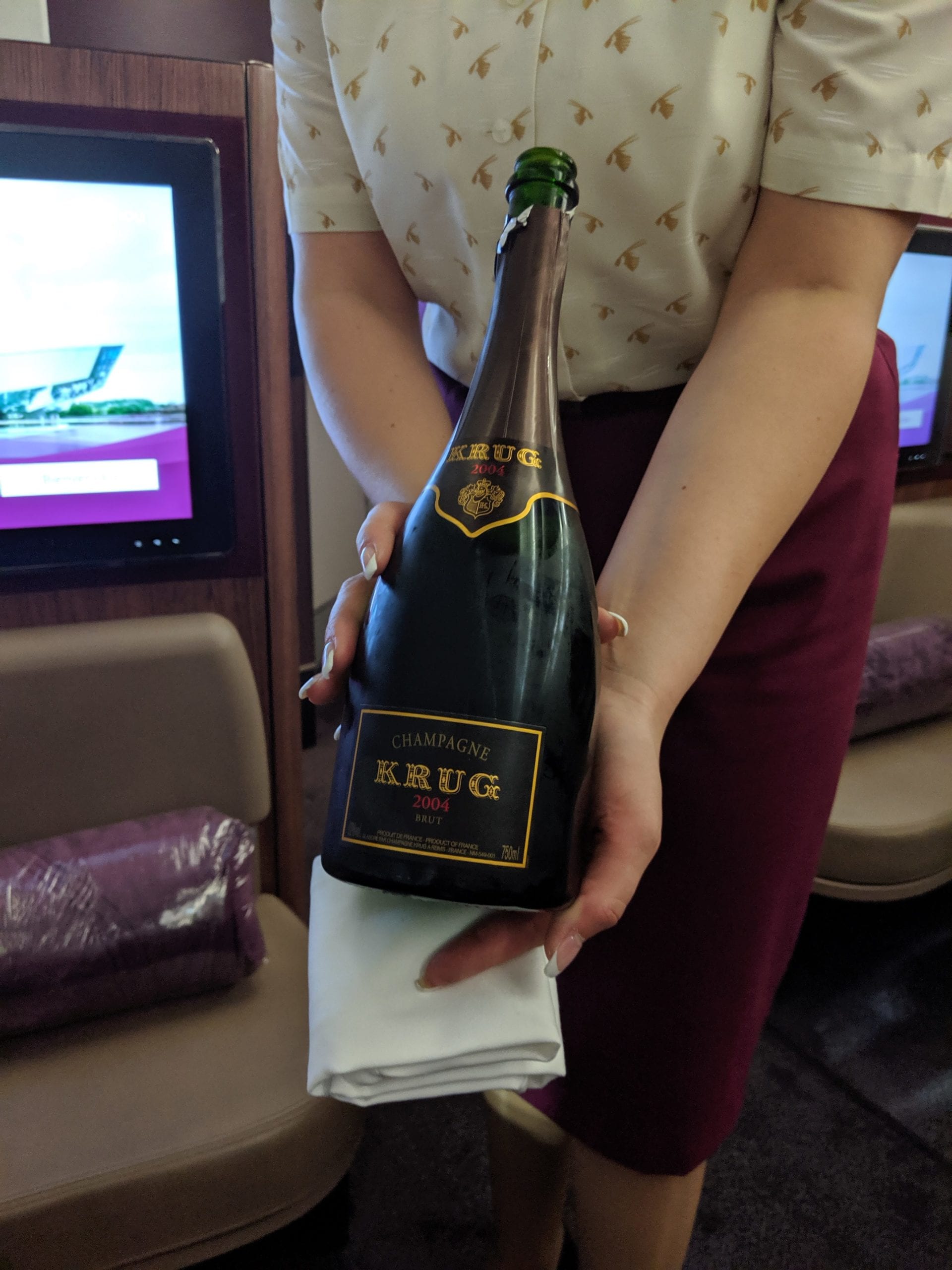 qatar airways first class champagne