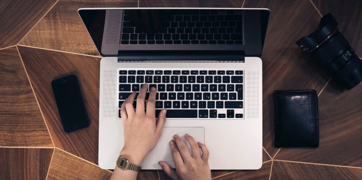 a person working on a laptop computer