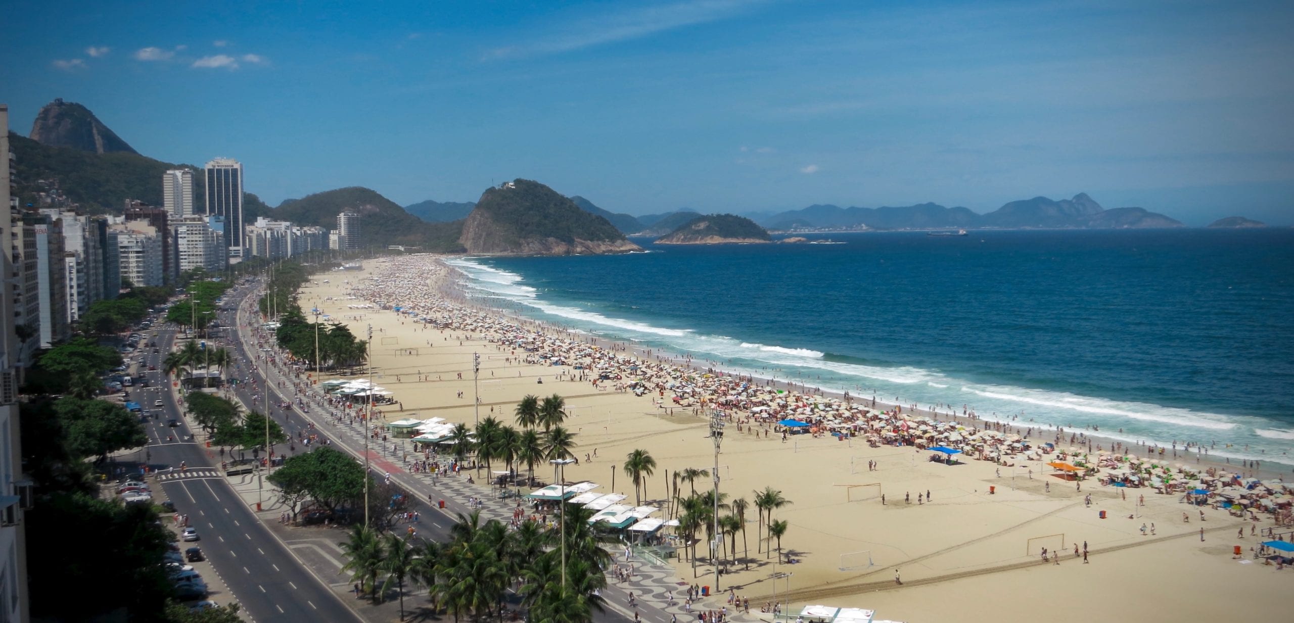 A crowd of people at a beach
