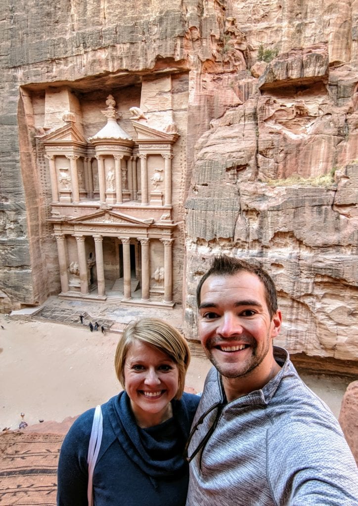 Planning the Perfect Trip to Petra, the Ancient City of Jordan 10 A couple standing in front of a building in Petra