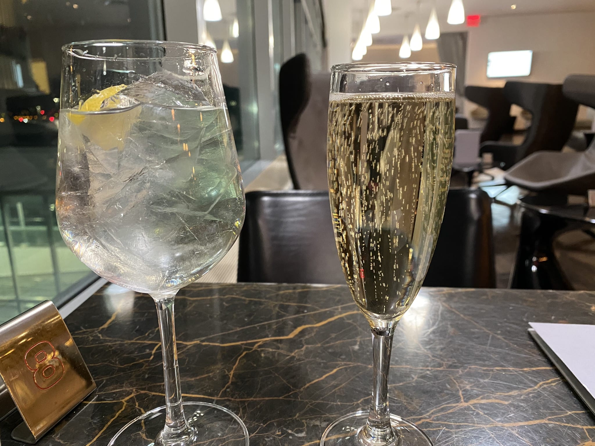 A glass of wine, with Virgin Atlantic and Airport