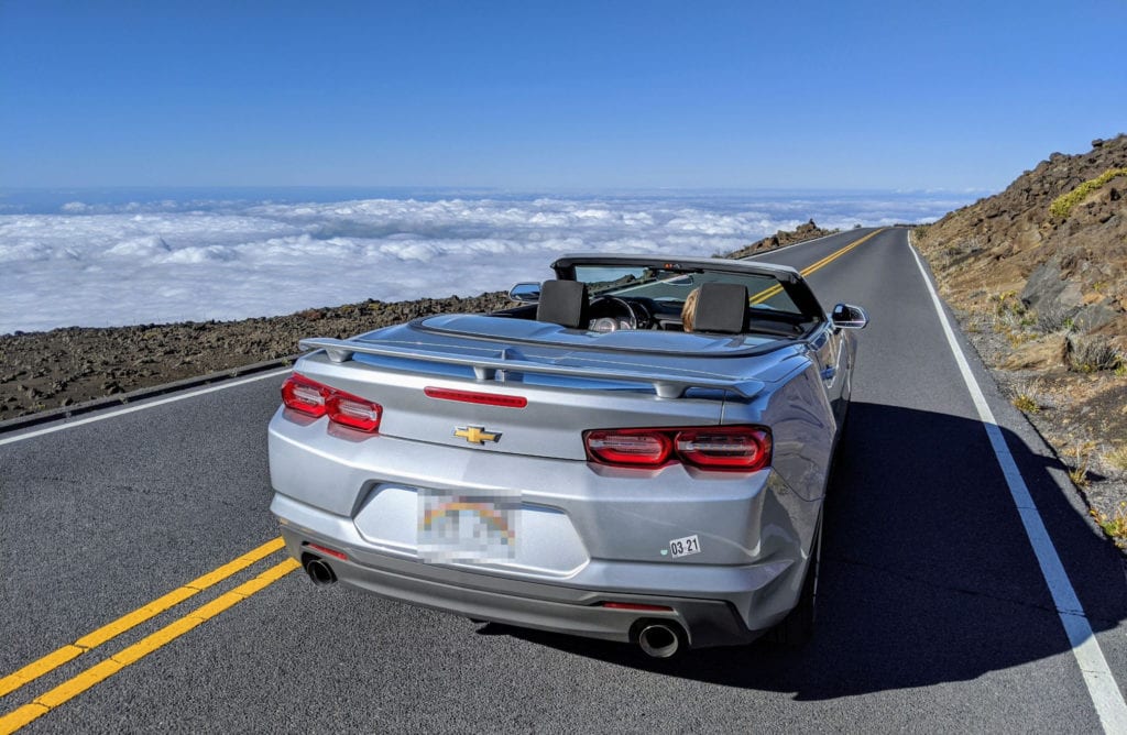 A car parked on the side of a road