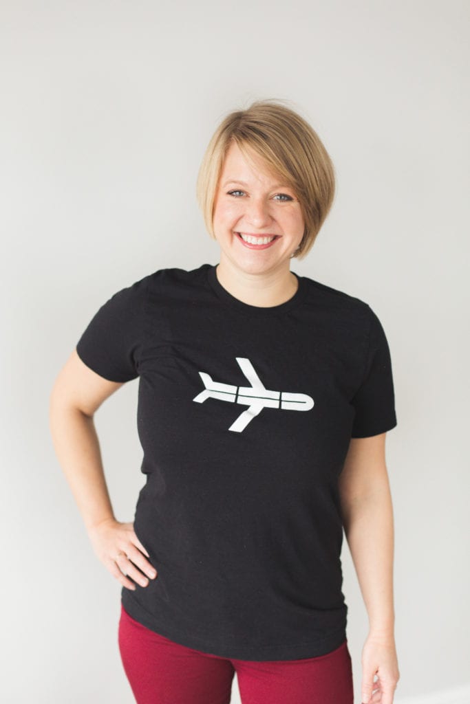 A person standing posing for the camera