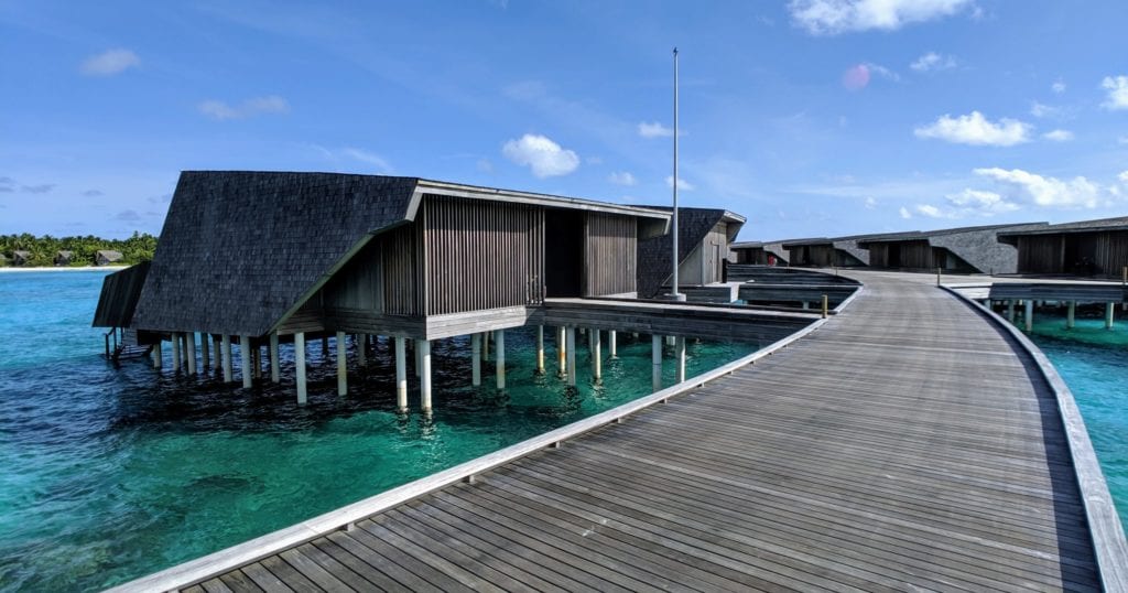 The Best Bets for 2020 International Travel (And Next Year, Too) 5 A wooden dock in front of a pool of water