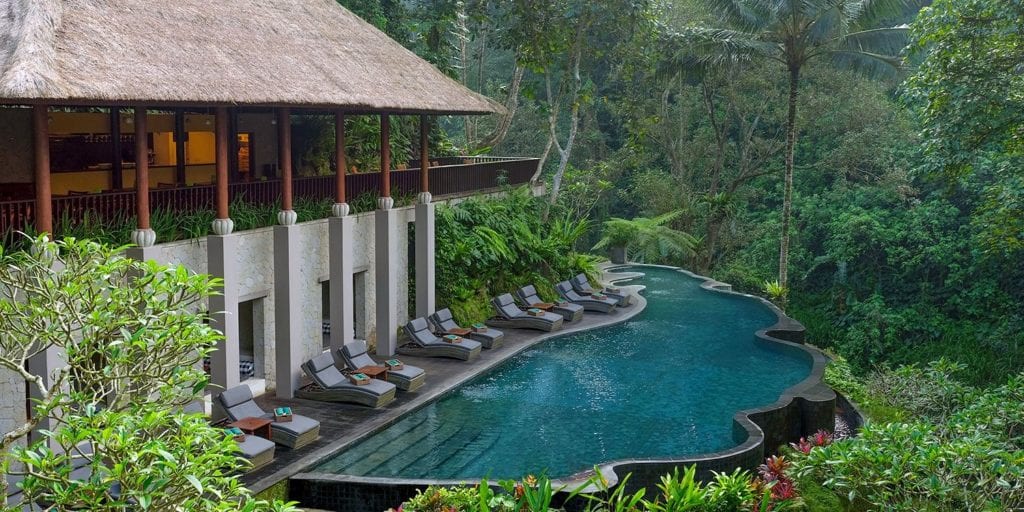 10 Nights in Bali for $899: Beach & Rainforest Escape Through 2022 3 a pool in bali