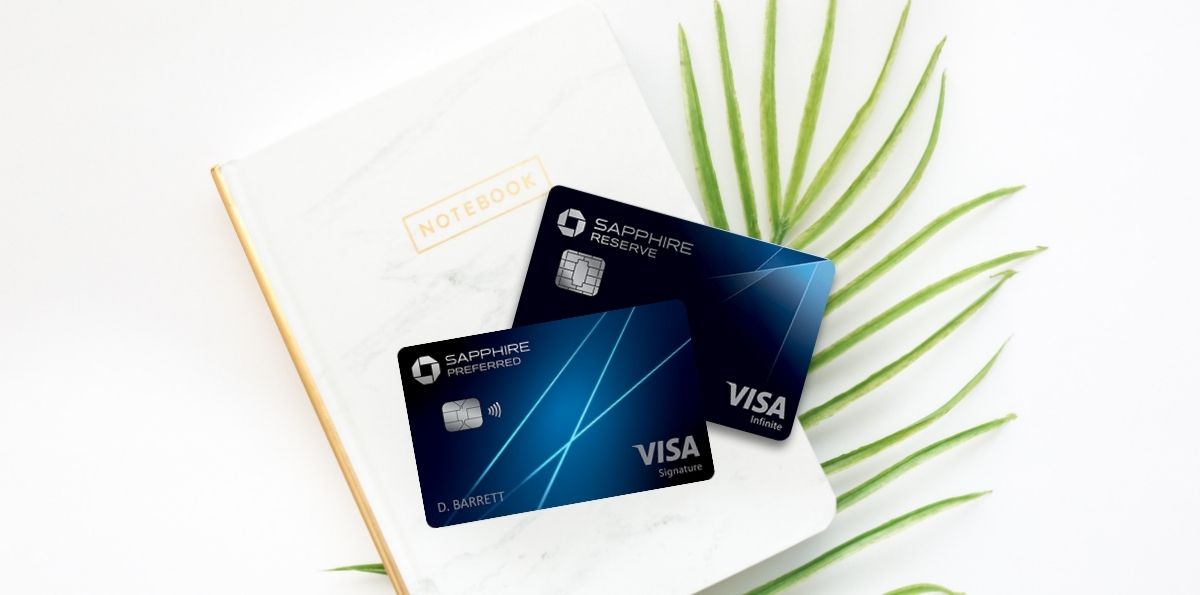Chase Sapphire Preferred and Reserve cards on a notebook