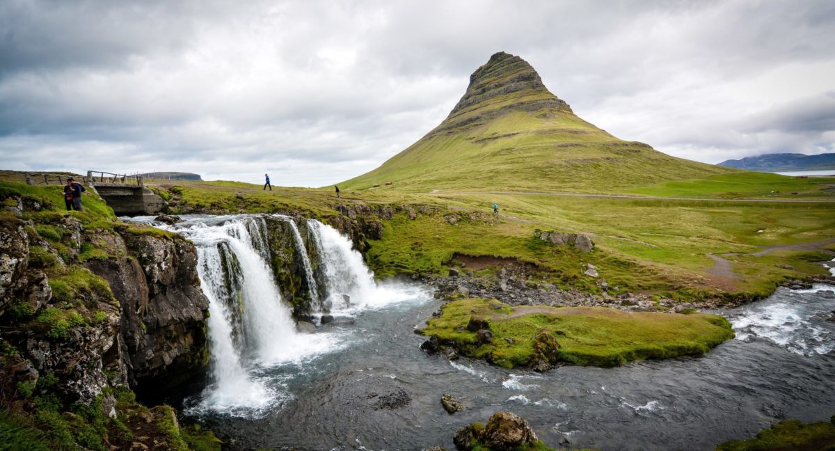 Two Countries, One Price: How to Book an Icelandair Stopover 19 Kirkjufell mountain in Iceland with a waterfall in the foreground