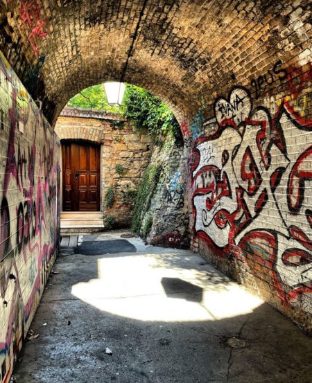 What it's Like to Visit Croatia in 2021: Know Before You Go 4 A stone building that has graffiti on the wall in Croatia