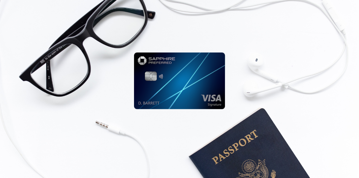 Chase Sapphire Preferred card with a pair of glasses and passport.