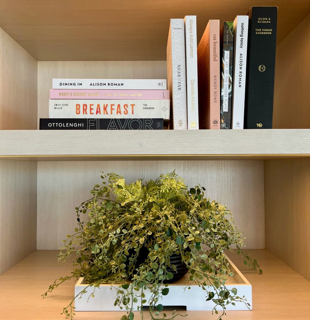 cookbooks and a plant