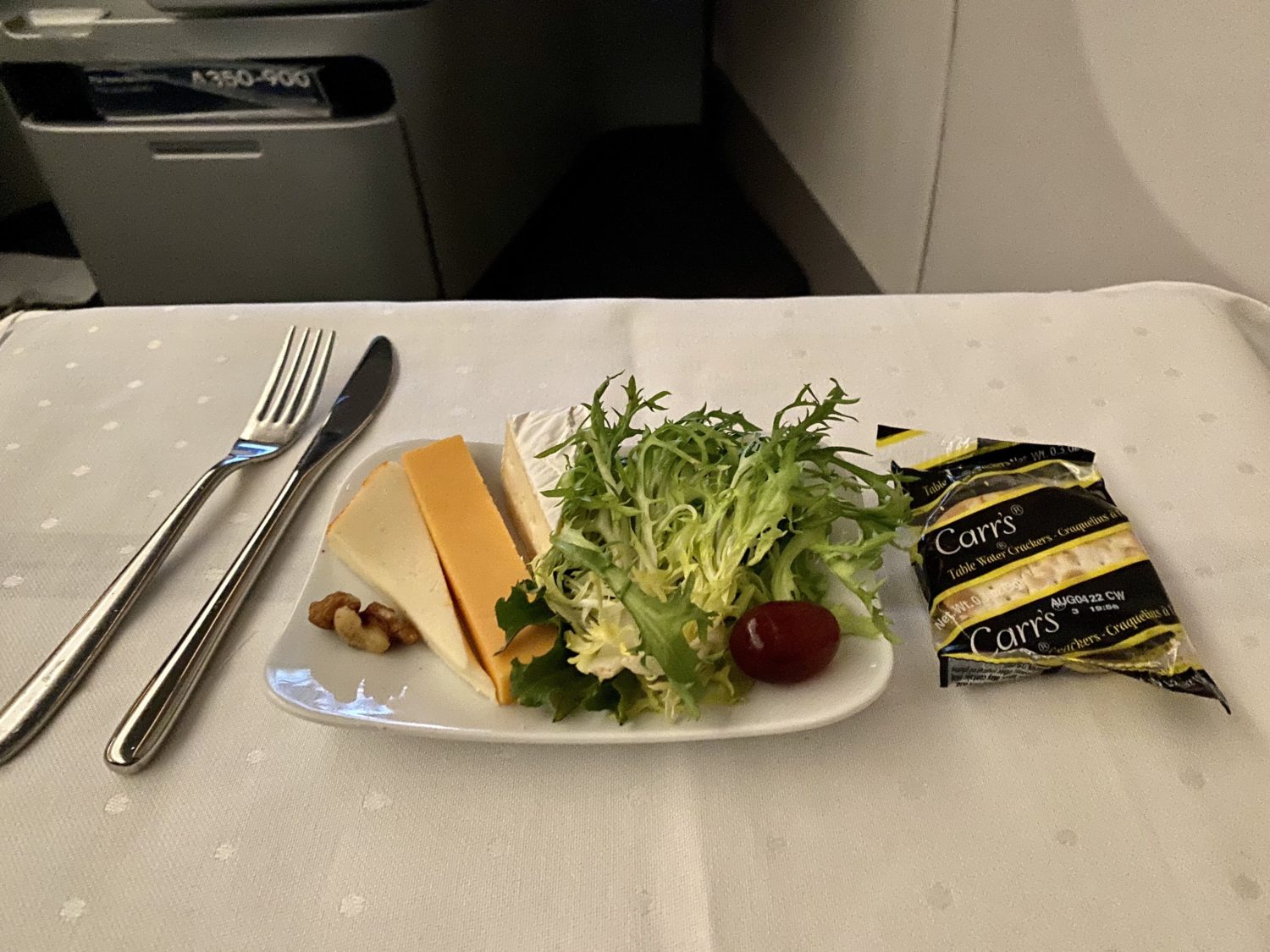 cheese plate with frisee salad