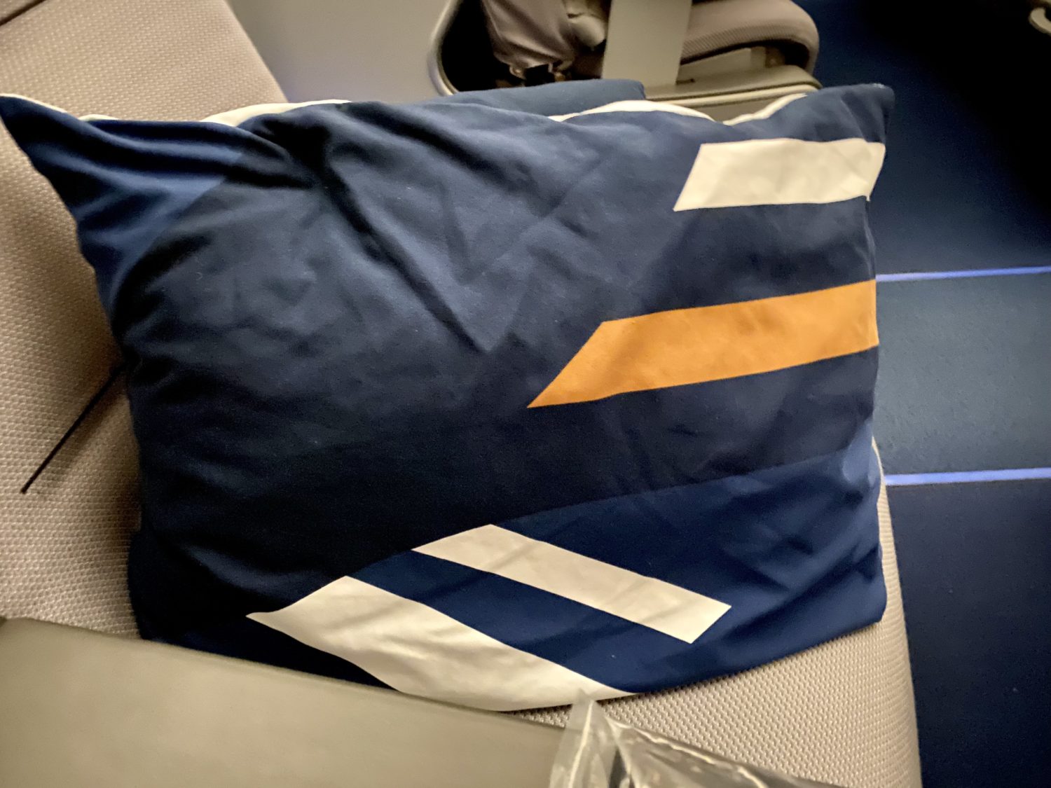 blue white and yellow pillow