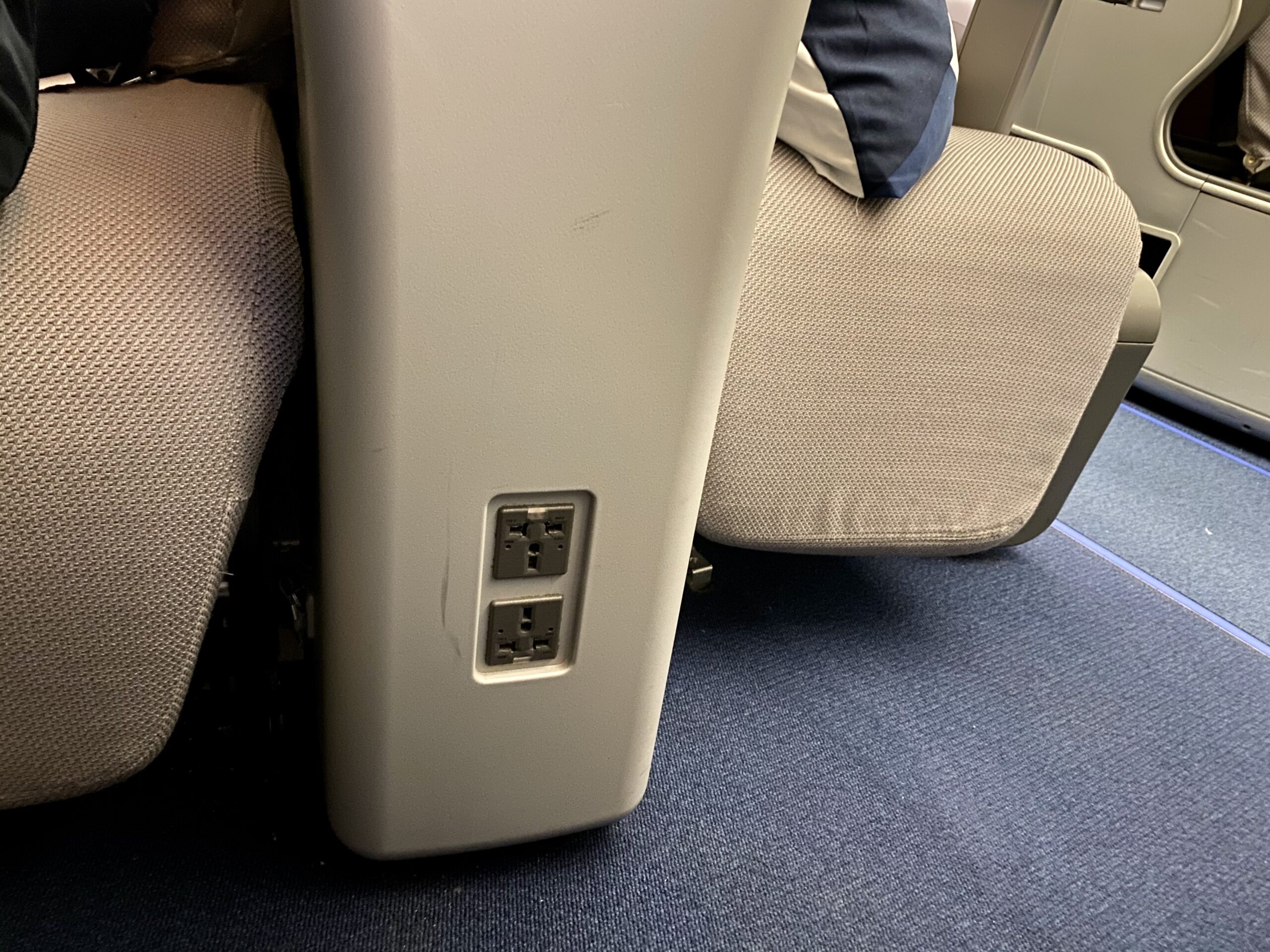 outlets built between business class seats