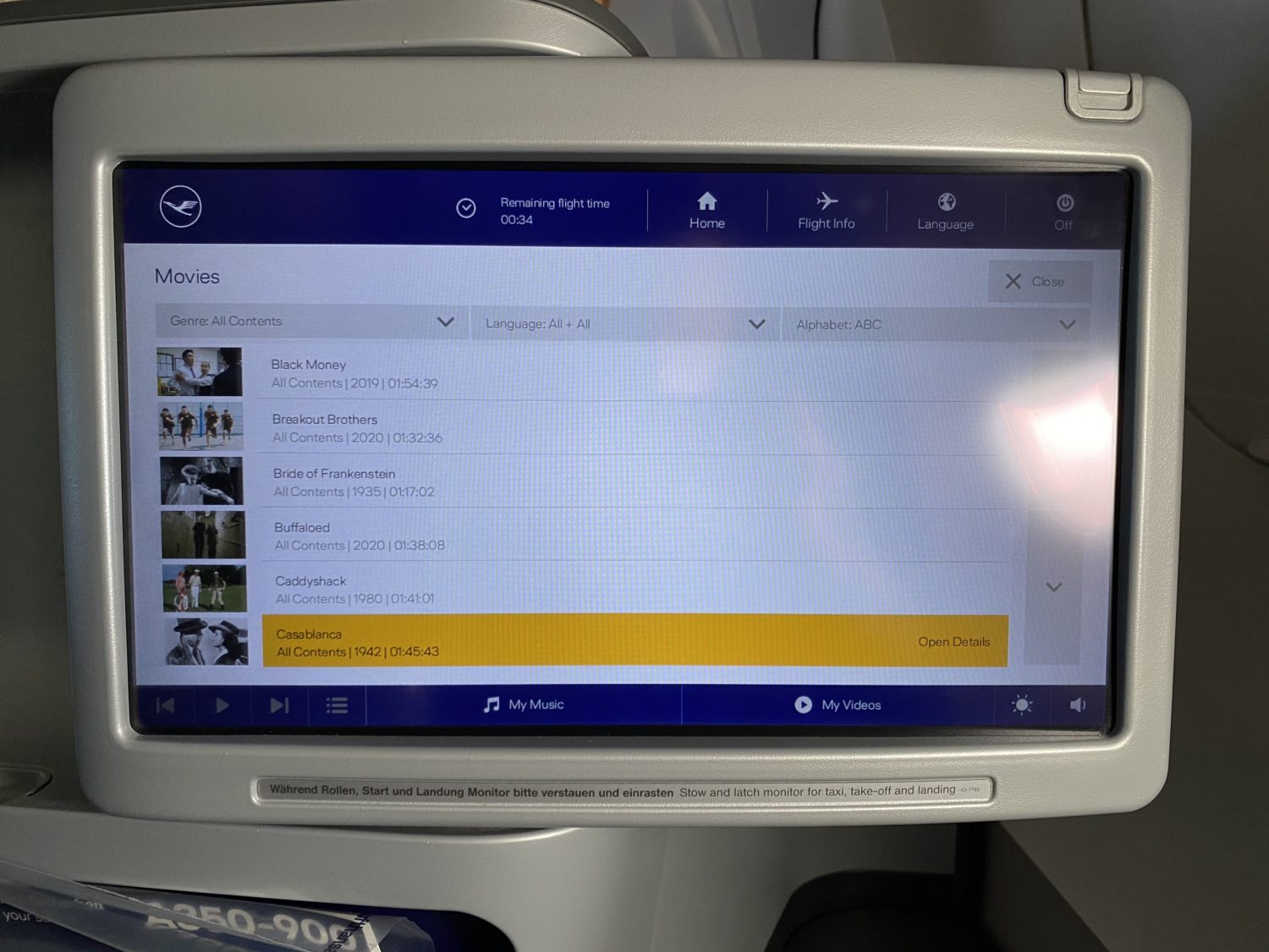 movie selections on a plane seatback screen