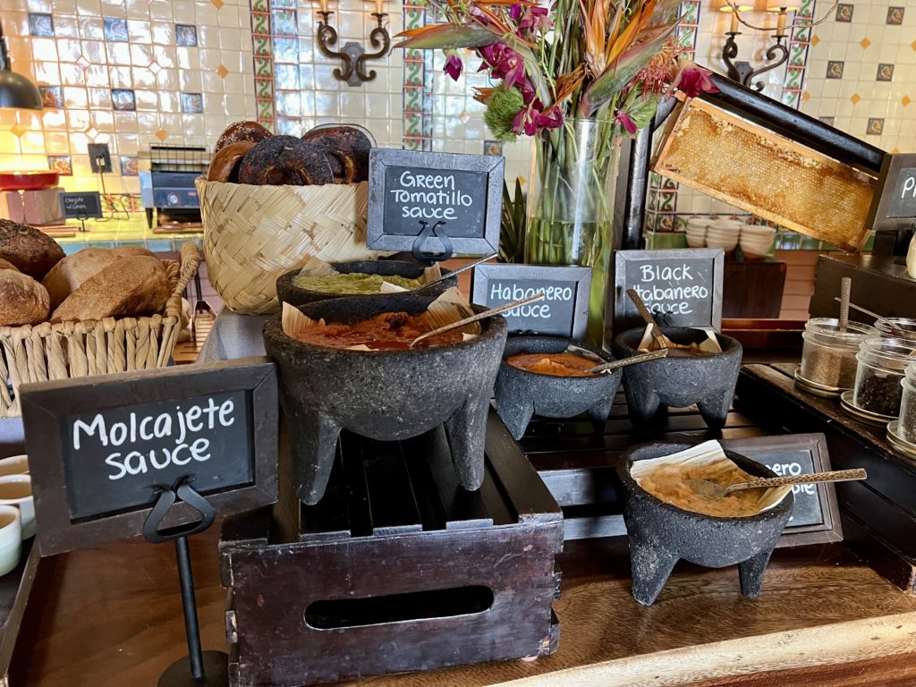 several containers of salsa