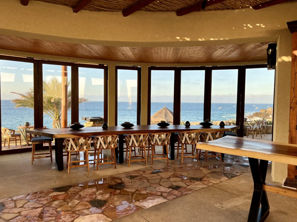 a long table with windows in the room