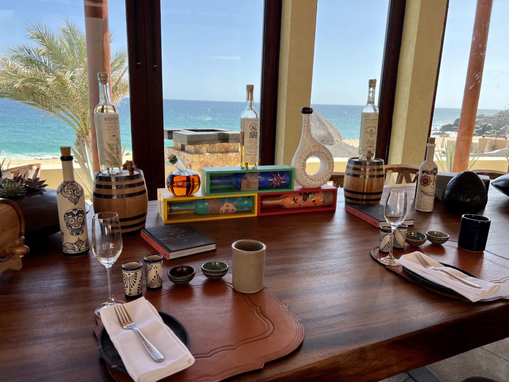 several different bottles of liquor on a decorative display