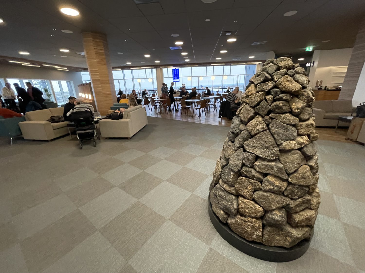 A lava rock decoration in an airport lounge. 