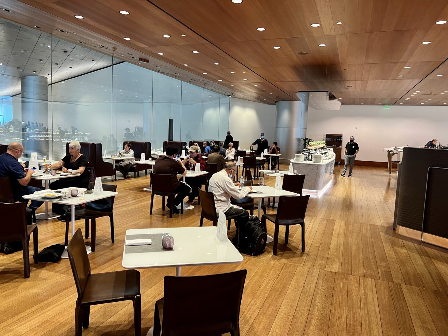 Dining room tables with many guests seated