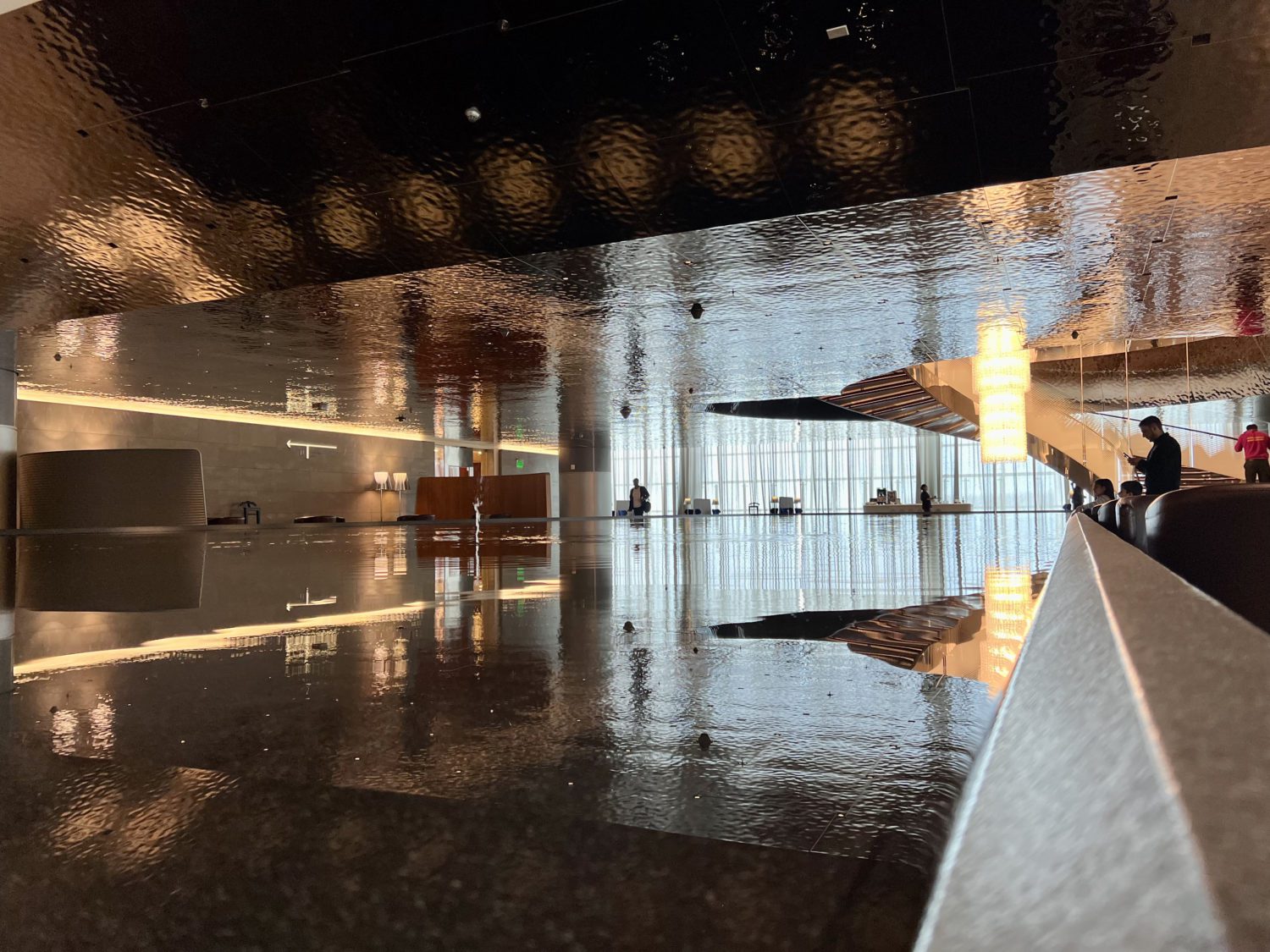 long reflected pool of water