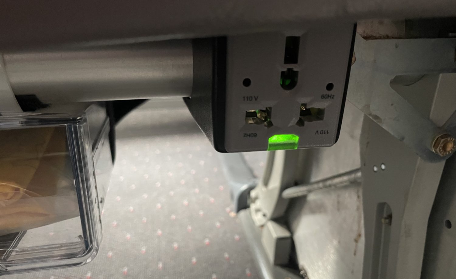 Power outlet on an airplane seat