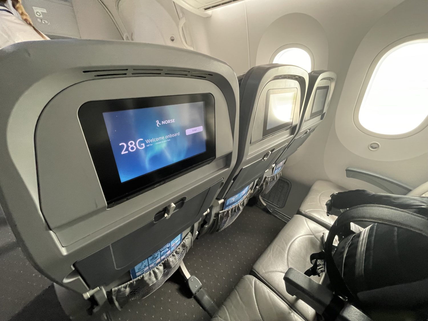 The interior of a Boeing 787 Dreamliner in the economy cabin