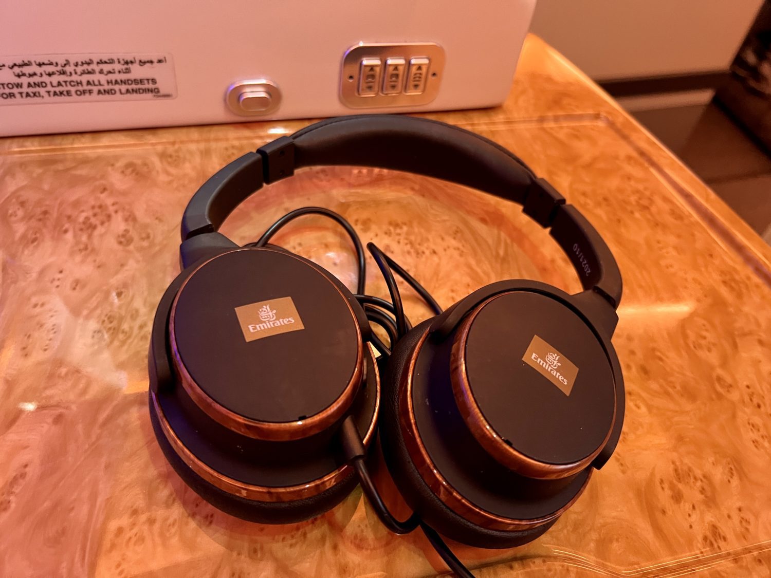 a pair of large headphones with emirates logo on both ears