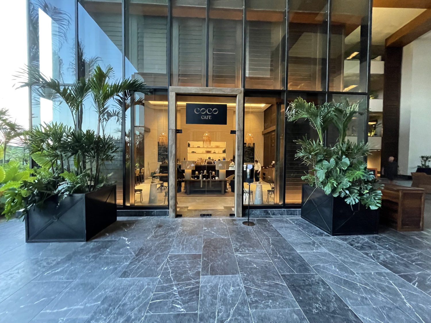 entrance to an onsite coffee shop at a hotel