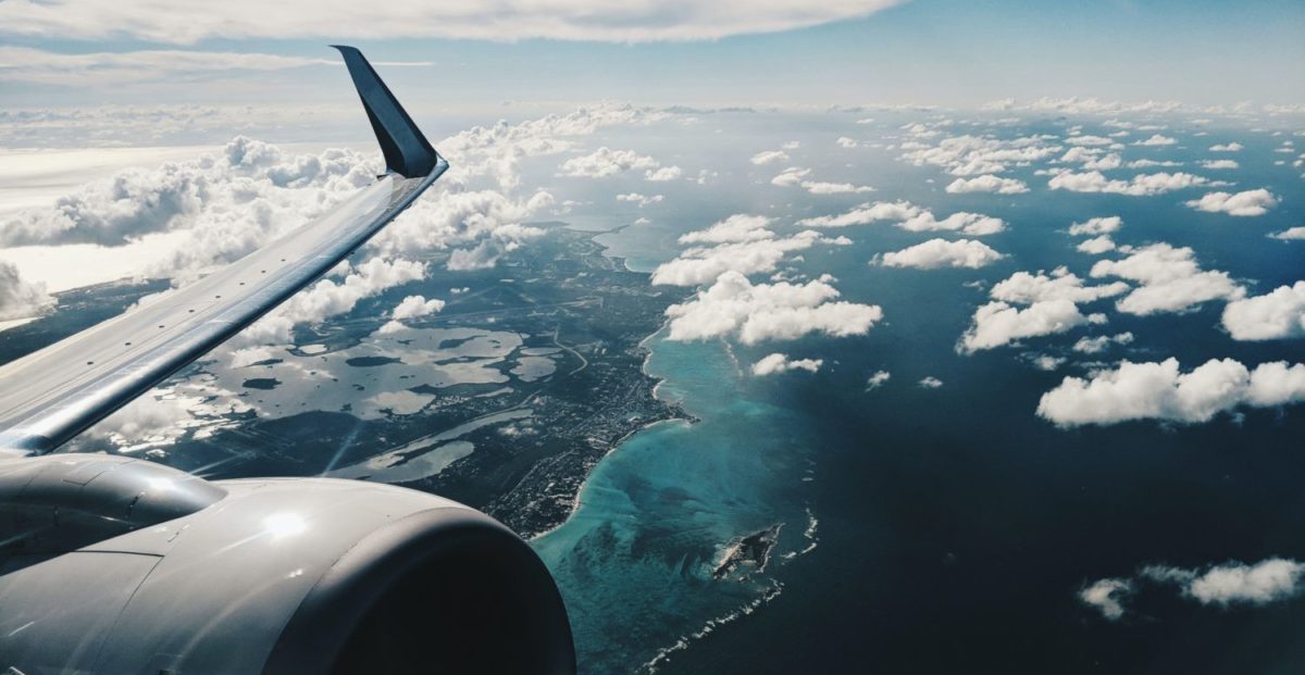 A view of an airplane flying in the sky