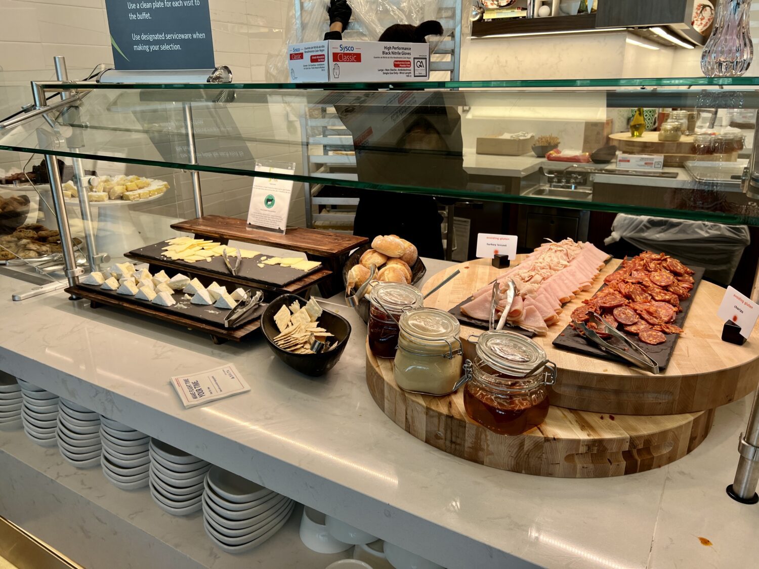 charcuterie display with meats, cheeses and jam