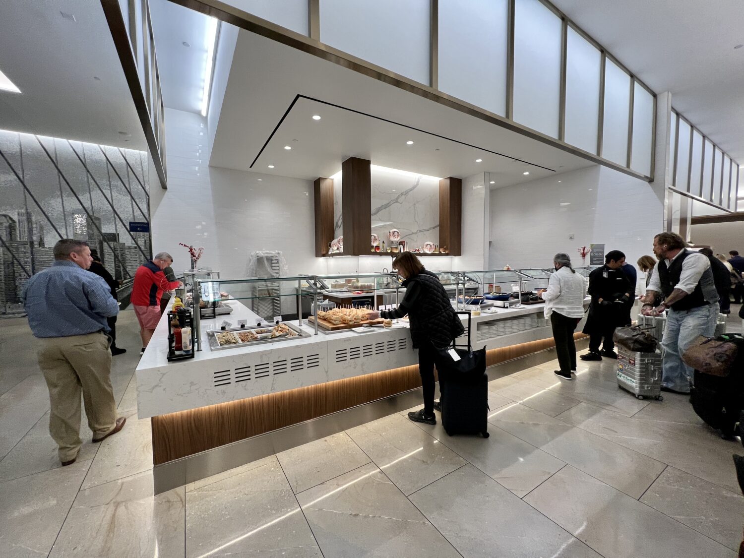 guests lined up at a buffet