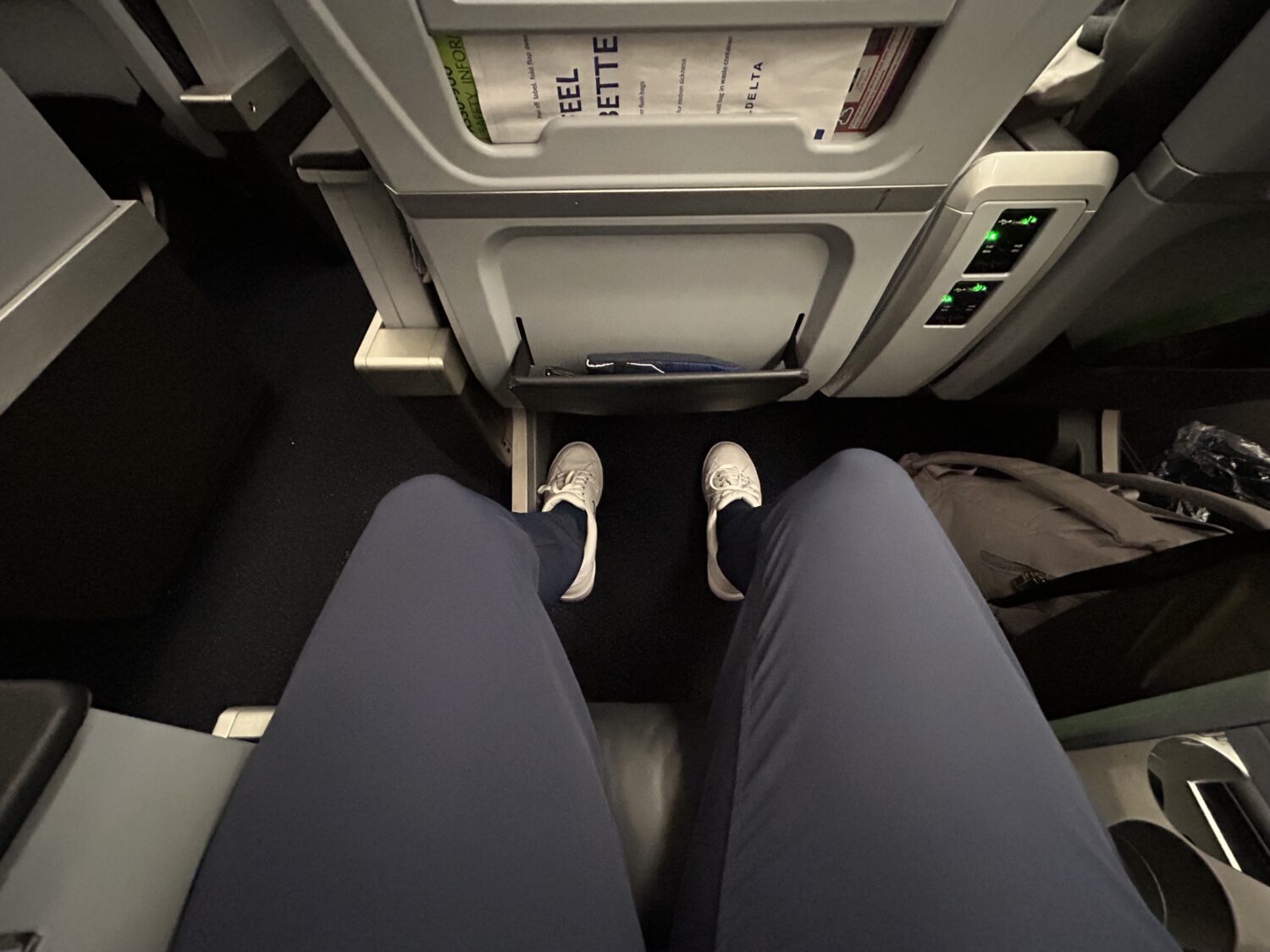 Legroom in a premium economy airplane seat