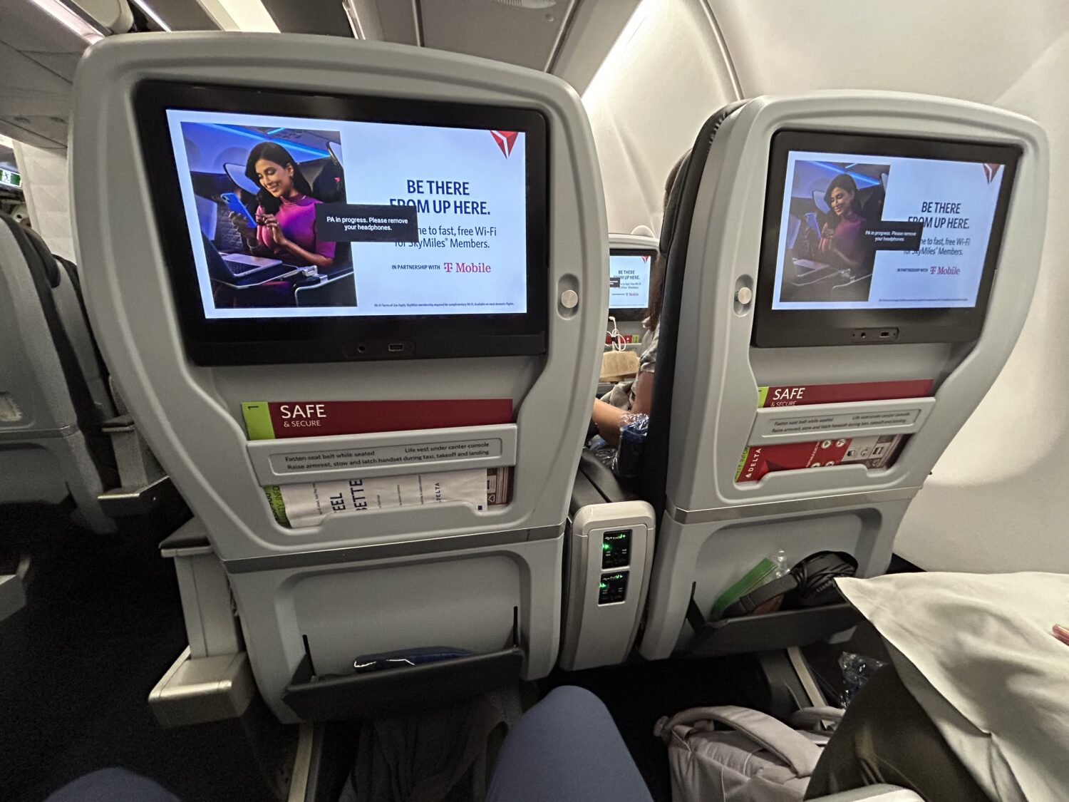 Seatback screens on airplane seats