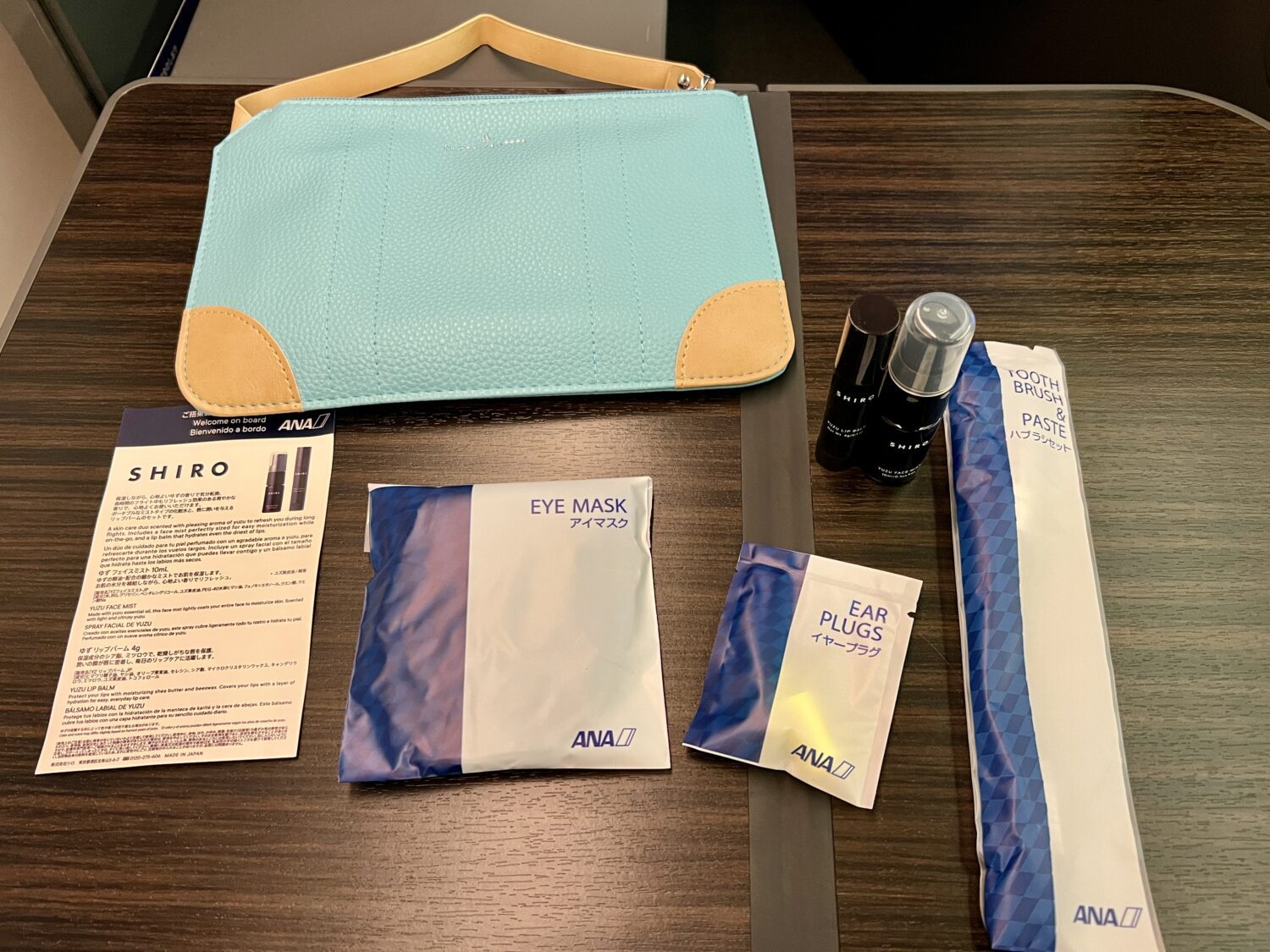 amenity kit contents including eye mask and ear plugs