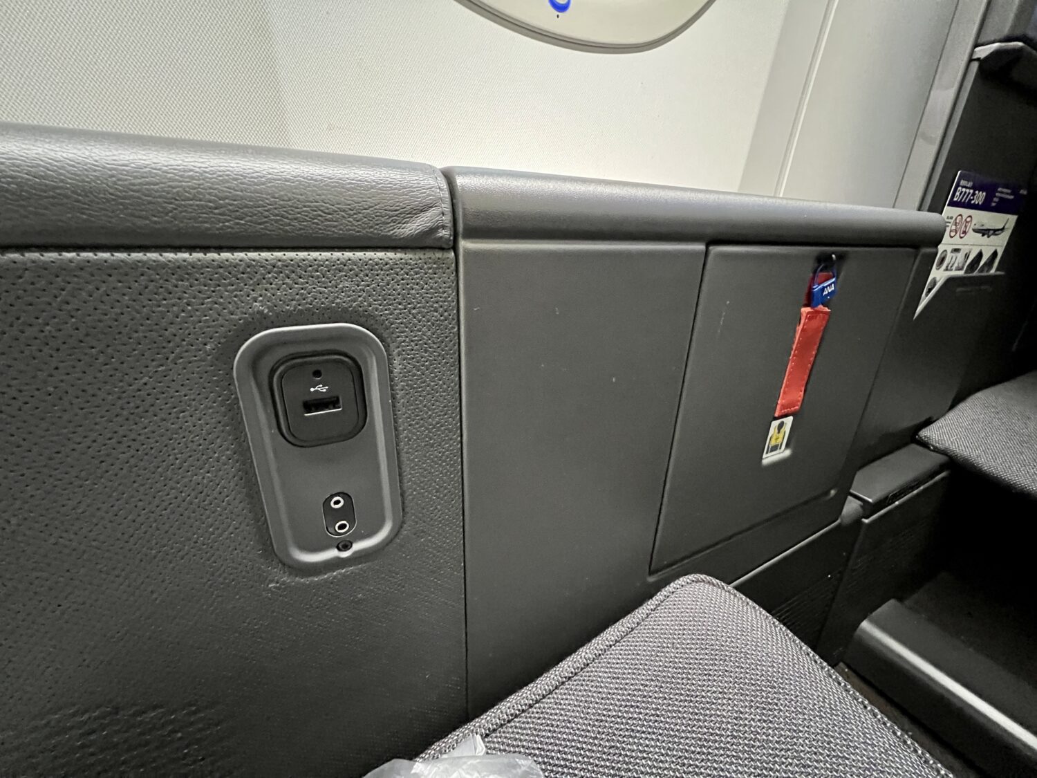 outlet for headphones and USB charging 