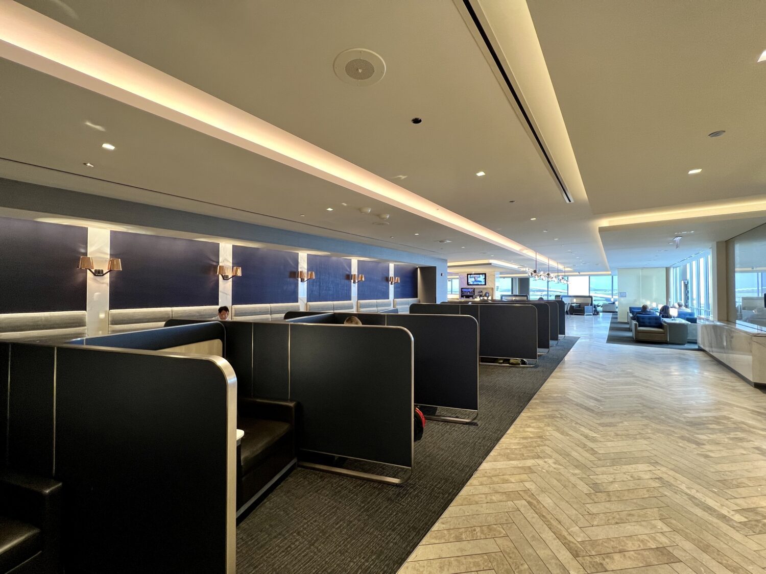 seating inside the united polaris lounge in chicago
